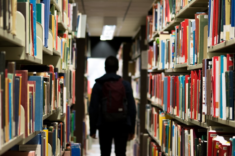 Student studying French with textbooks